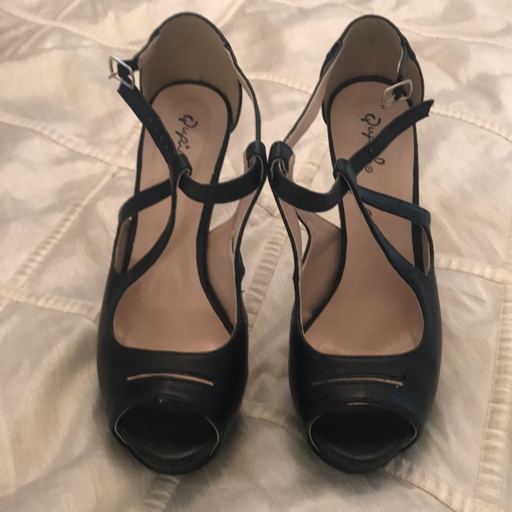 Black strappy high heels. Size 8 worn once.